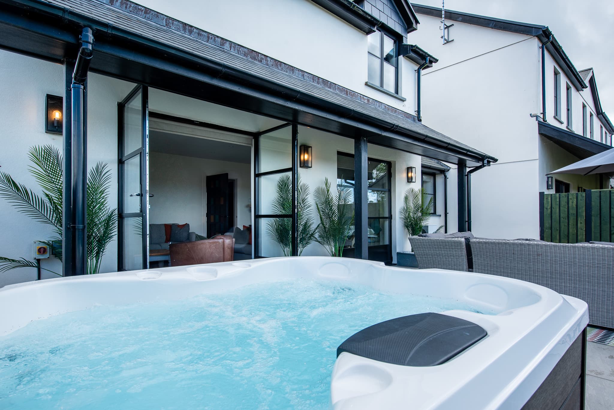 Private hot tub on the patio at Just a Cottage