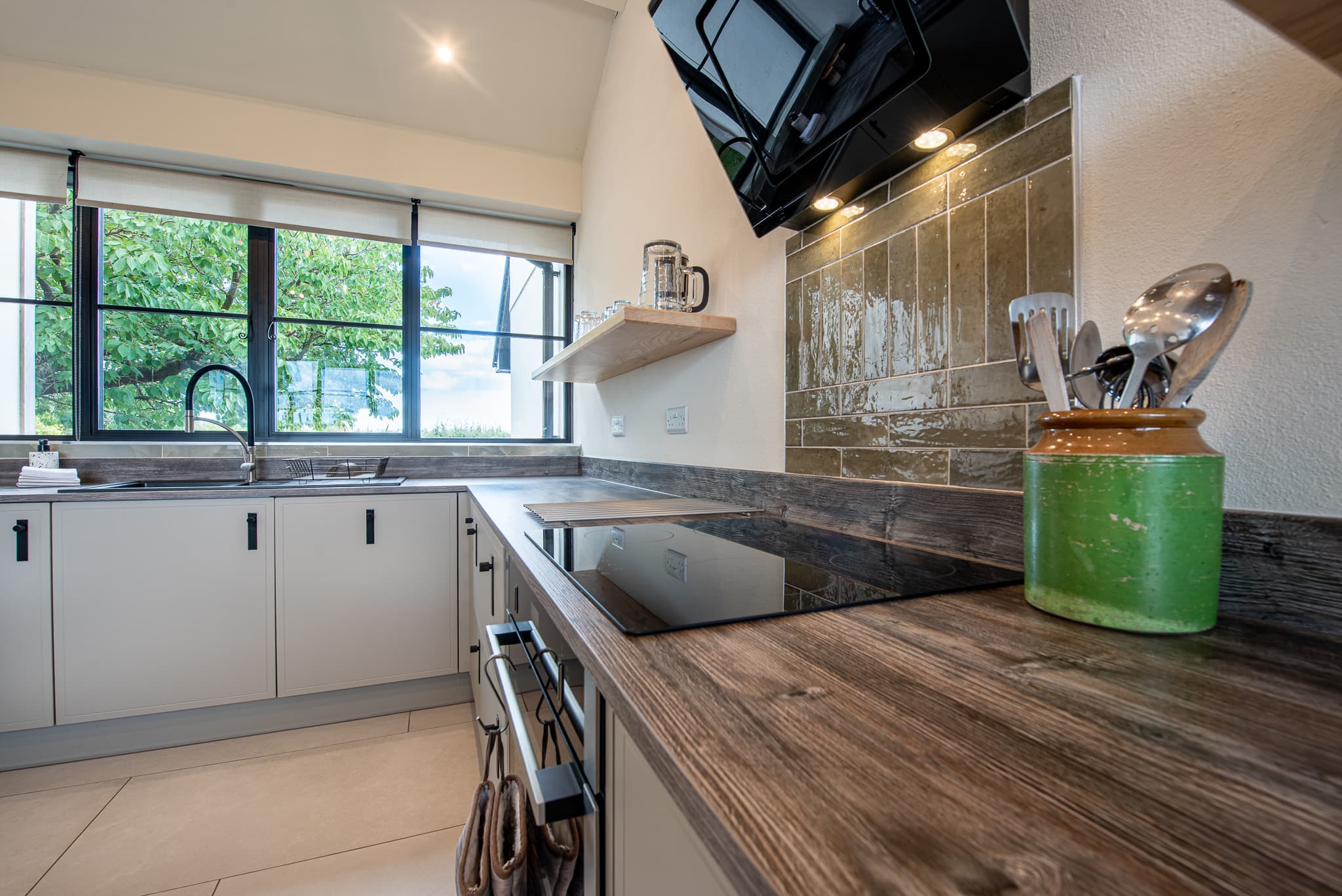Kitchen sink and hob at Just a Cottage