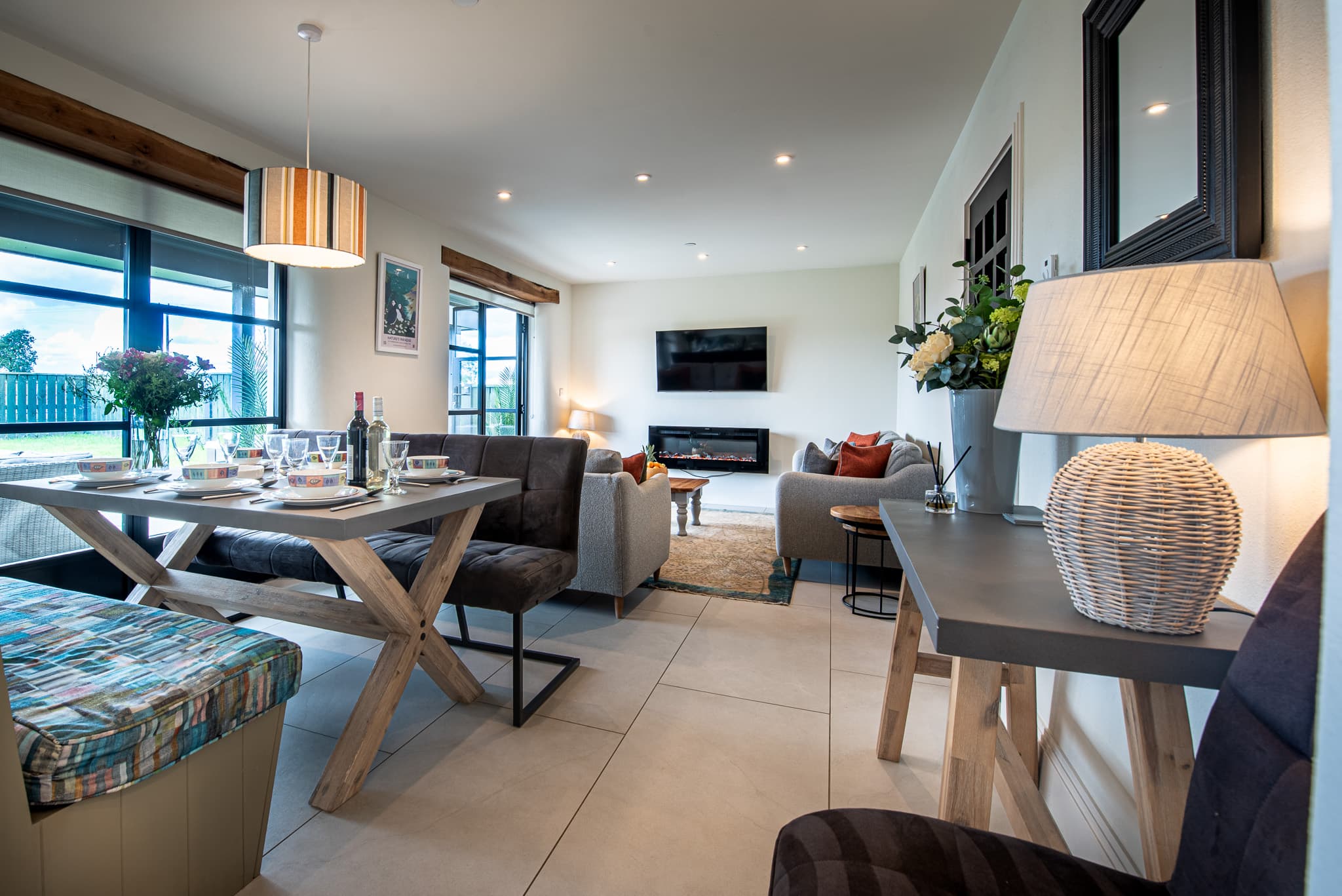 Open-plan living and dining area at Just a Cottage