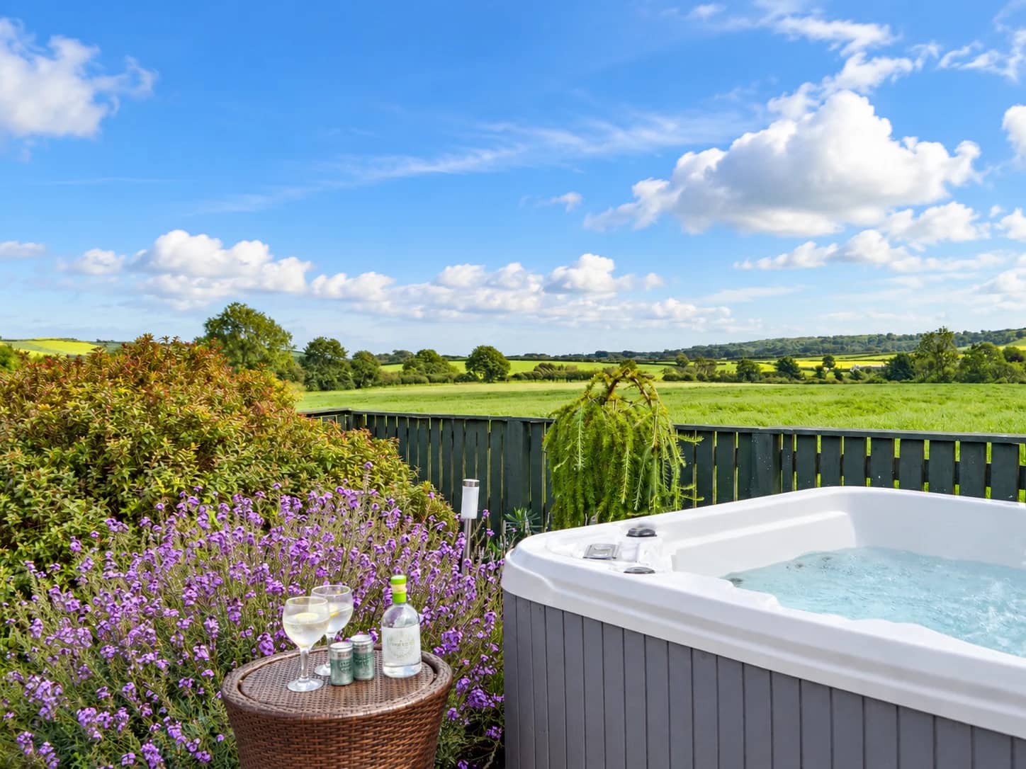 Hot tub with wine and countryside views at Pleasant Valley