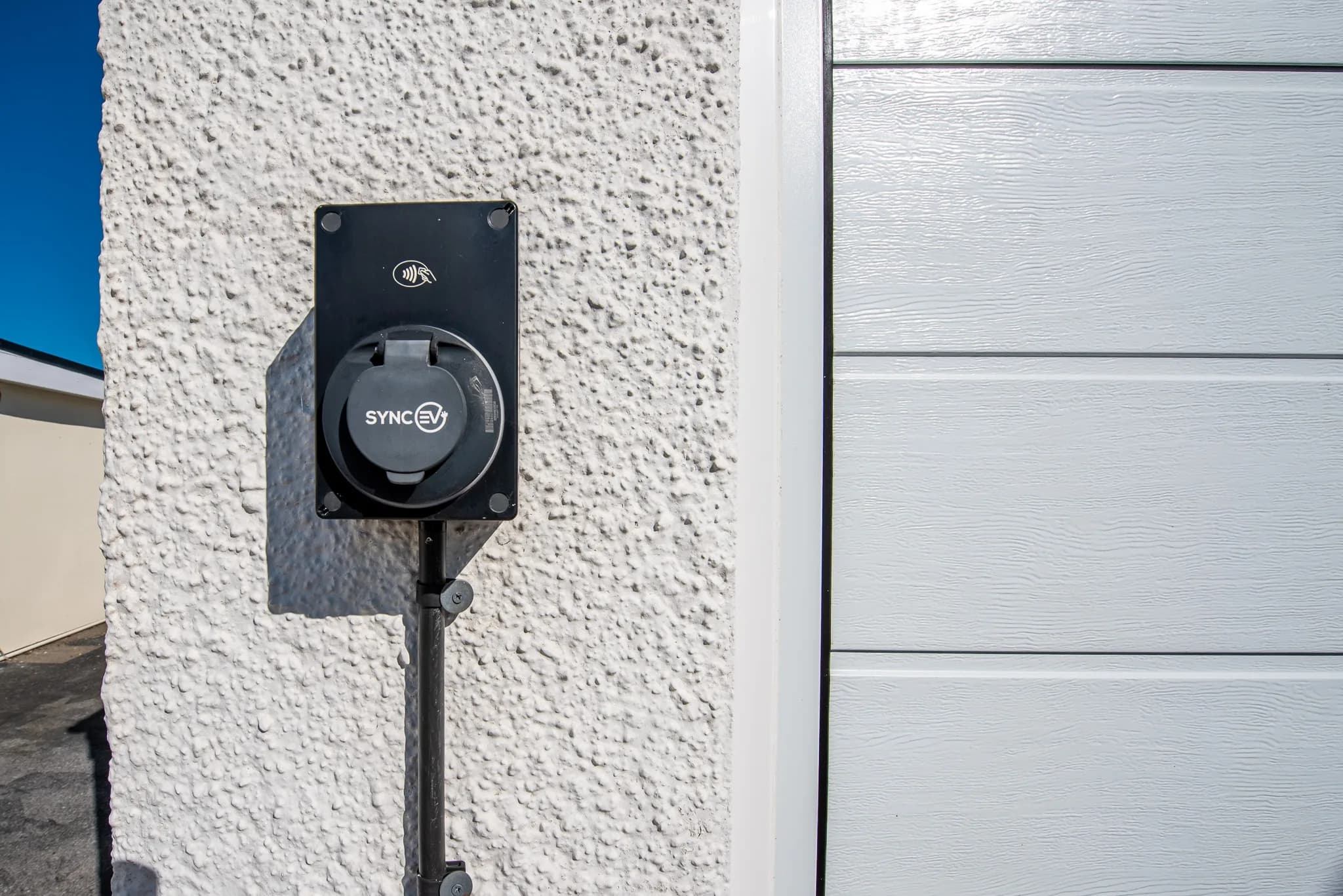 Electric vehicle charging point at Sea Dreams