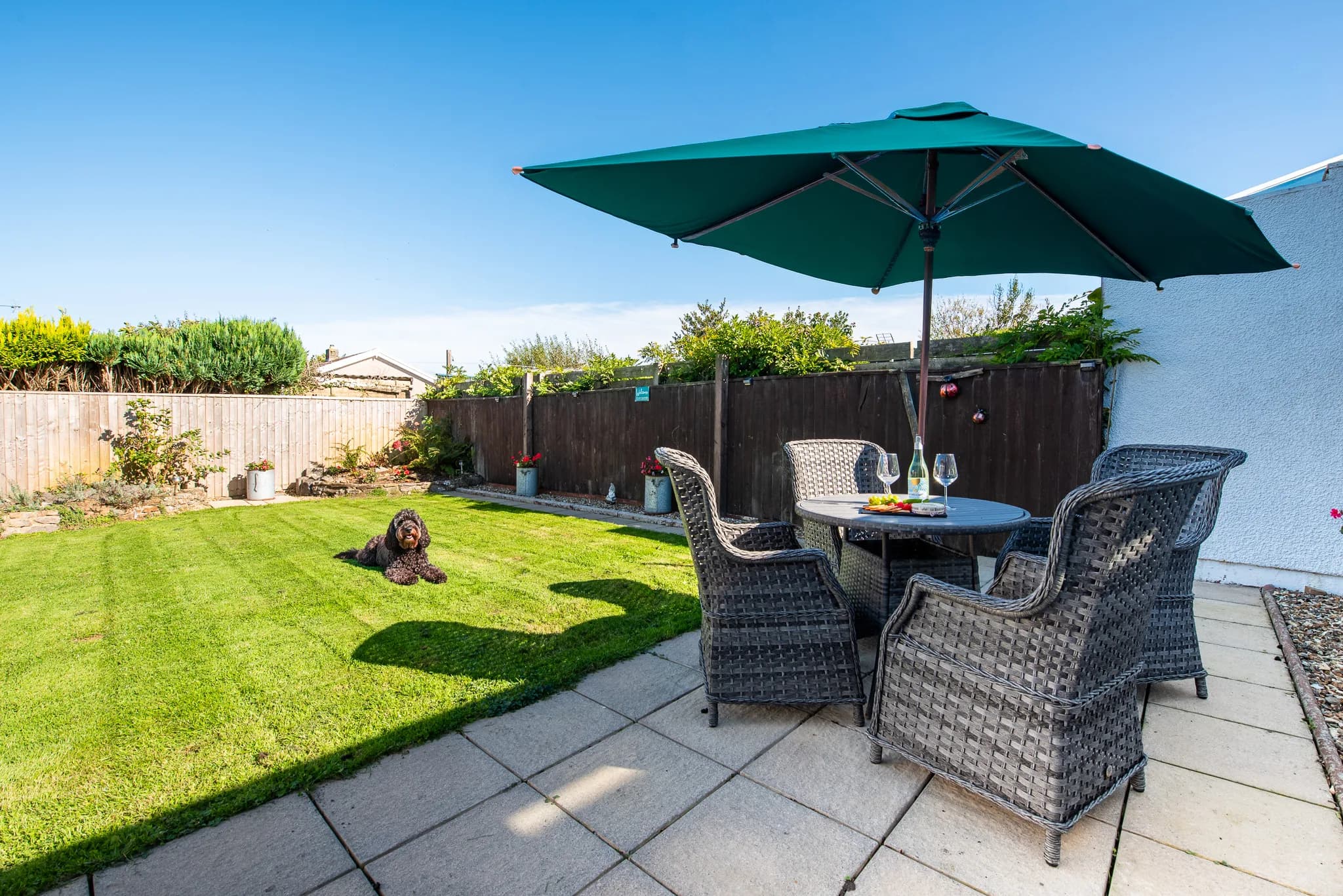 Enclosed rear garden and patio dining set at Sea Dreams