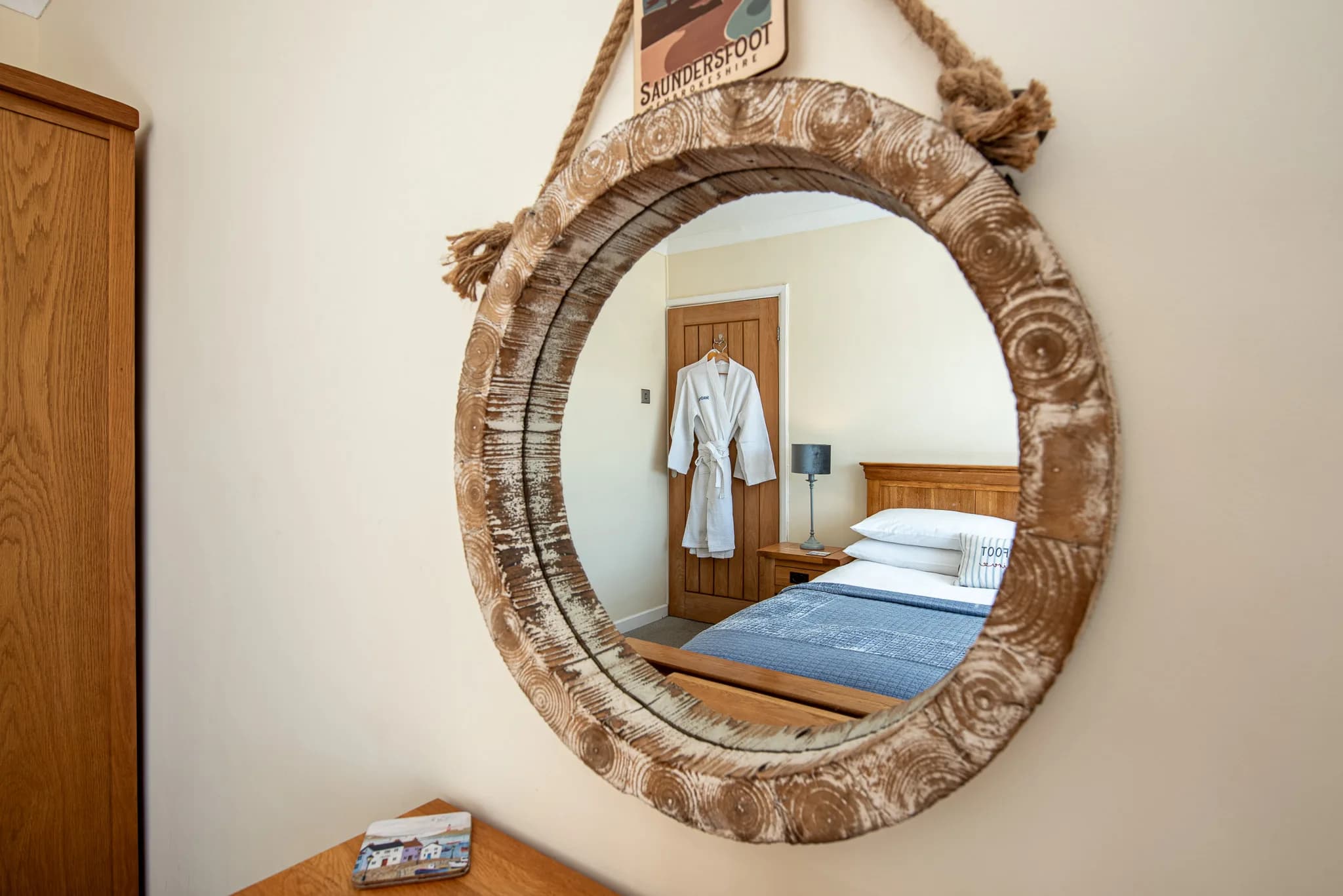 Round rope mirror in the master bedroom at Sea Dreams