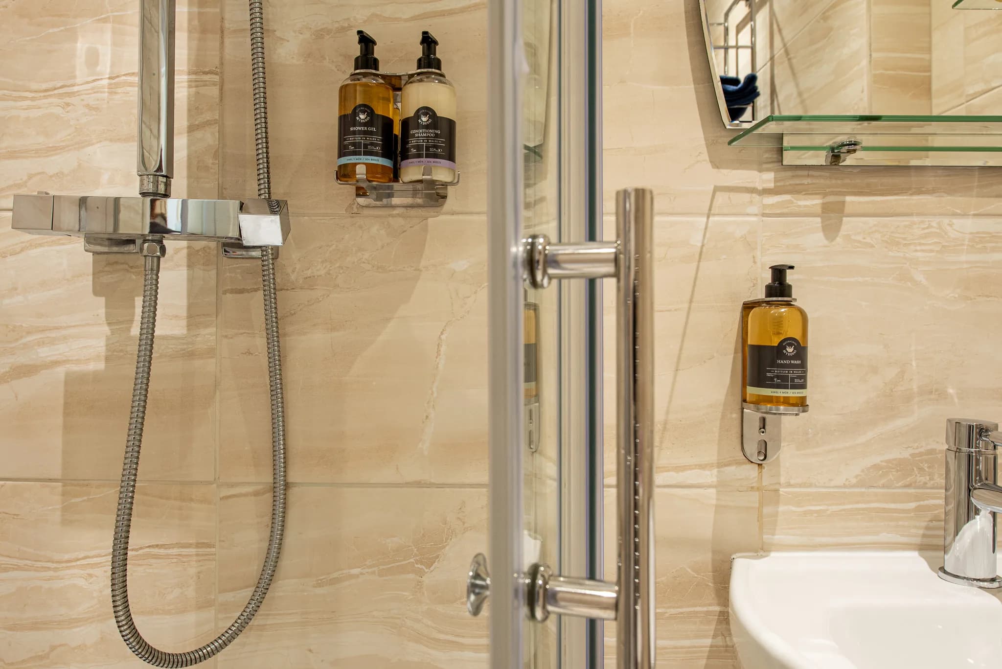 Shower and toiletries in the shower room at Sea Dreams